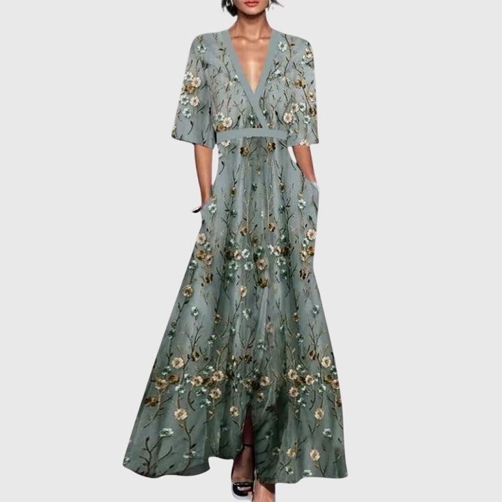 Elegant women's floral deep V-neck flowy maxi dress. Perfect statement party dress with chic contrast trim & pockets.
