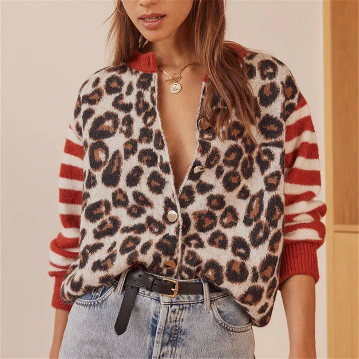 Women's bold leopard print knit cardigan with striped long sleeves and button-front closure.