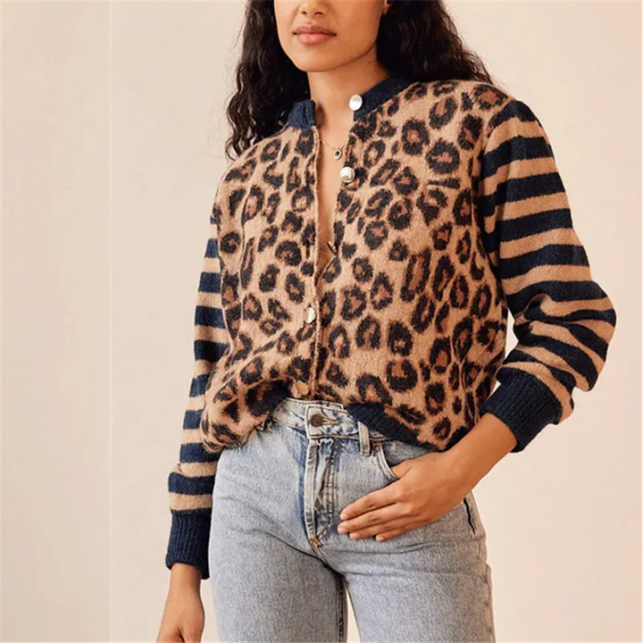 Button-front women's cardigan in bold leopard print, featuring soft knit fabric and contrasting striped sleeves.