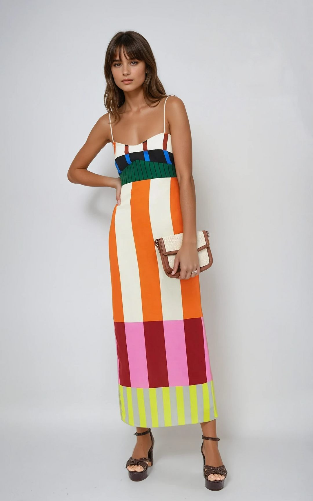 Stunning colourblock bodycon midi dress with bold stripes. Flattering fit, ideal statement dress for women's fashion.