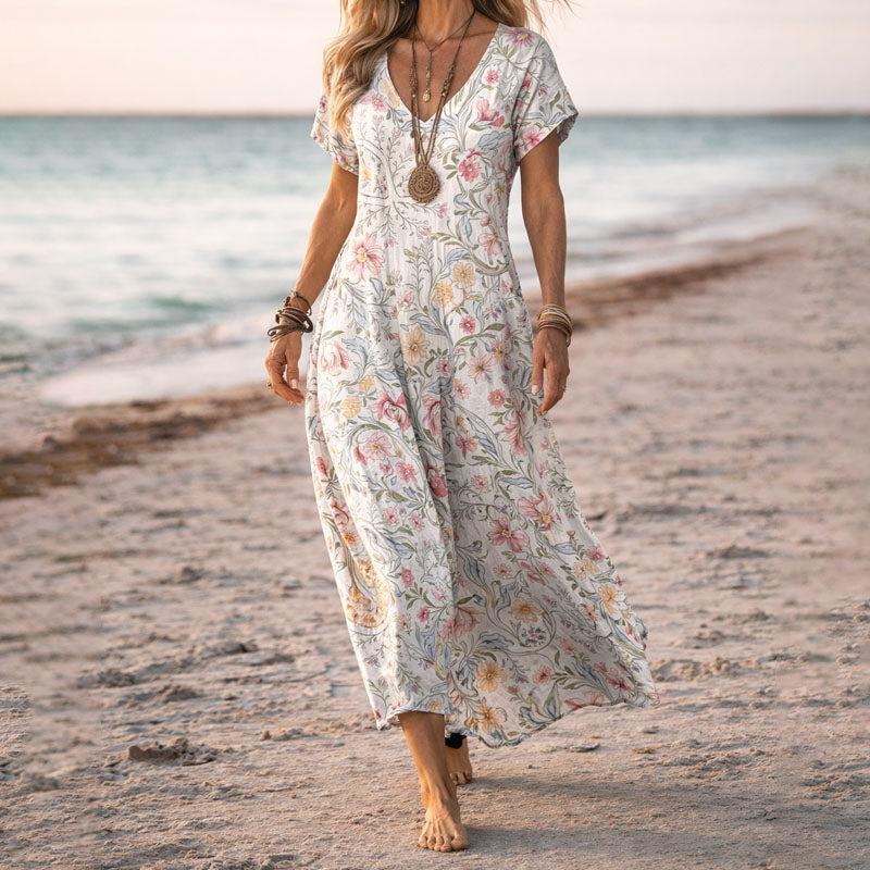 Women's botanical floral V-neck boho maxi dress. Flowy, elegant for summer, beach, or casual vacation wear.
