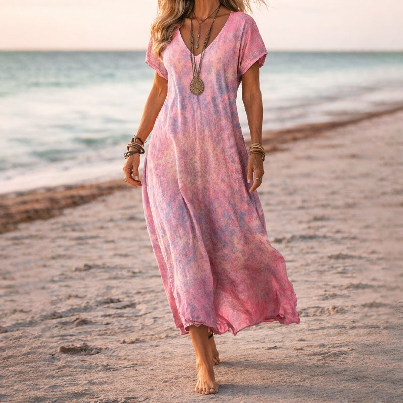 Elegant women's floral boho maxi dress with V-neck, ideal for summer beach days, vacations, or casual wear.