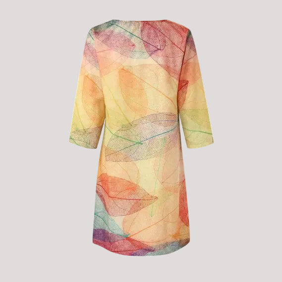 Stylish botanical print midi dress for women, ideal for casual summer outings or relaxed spring fashion.