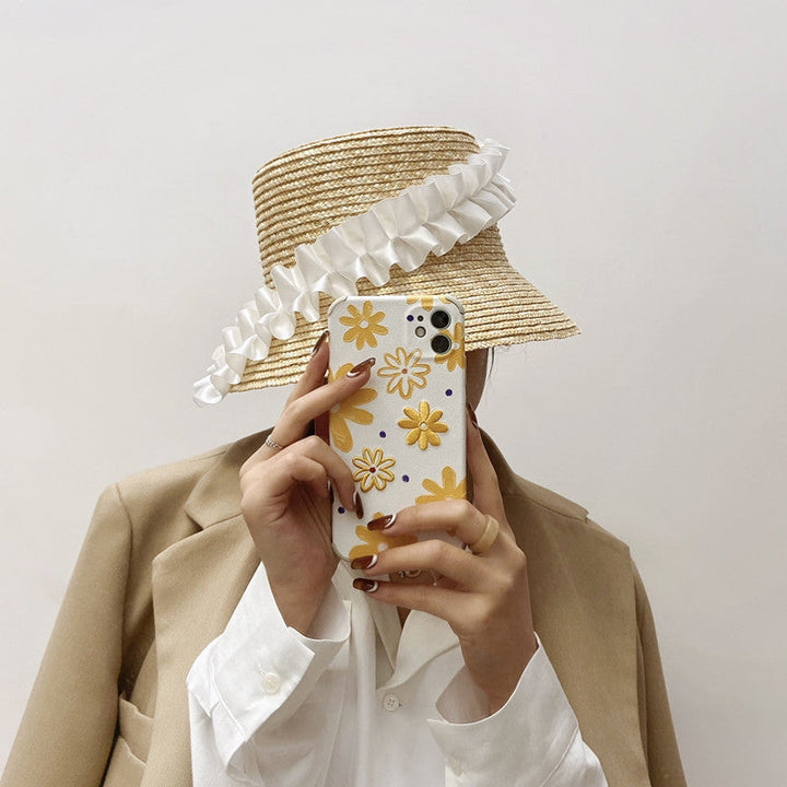 Fashionable women's braided straw sun hat featuring elegant khaki stripes, ideal summer accessory.