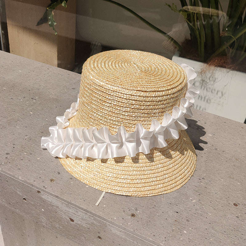 Chic women's summer straw hat, braided with attractive khaki stripes for sunny days.
