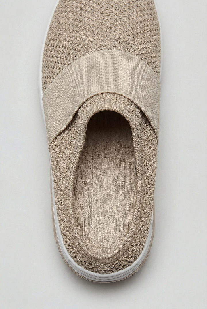 Stylish women's comfort mules featuring an innovative air cushion sole for superior support & walking ease.