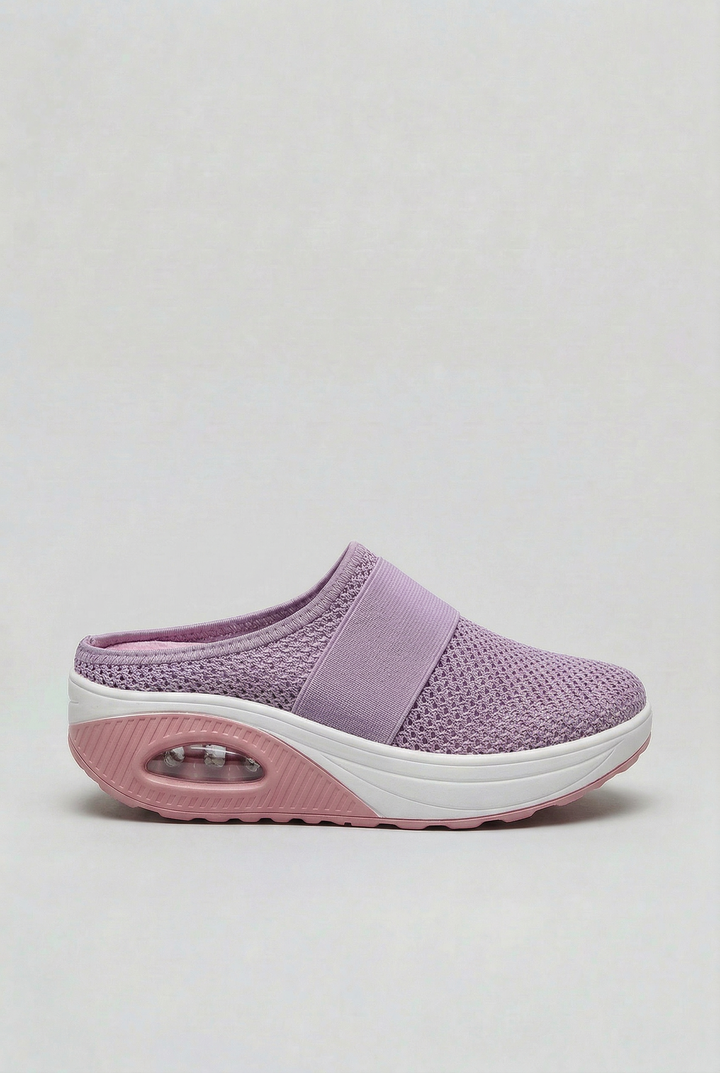 Top view of women's breathable slip-on mules, highlighting the wide opening and comfortable footbed.