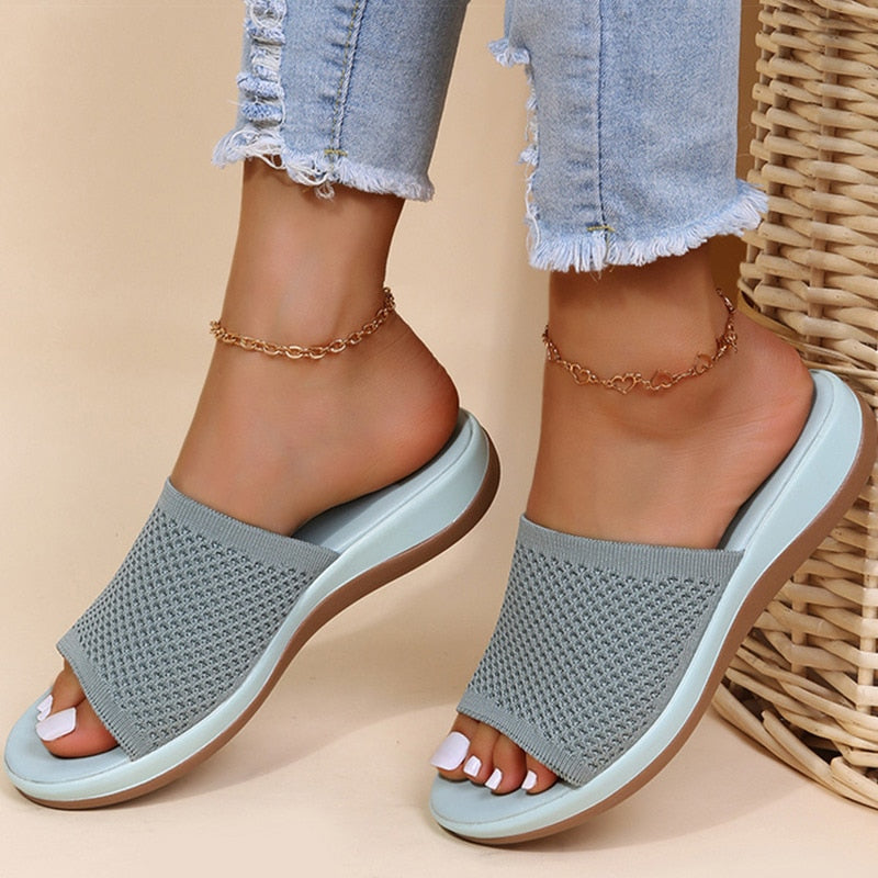 Stylish women's breathable slippers providing orthopedic support and all-day cushioned comfort.
