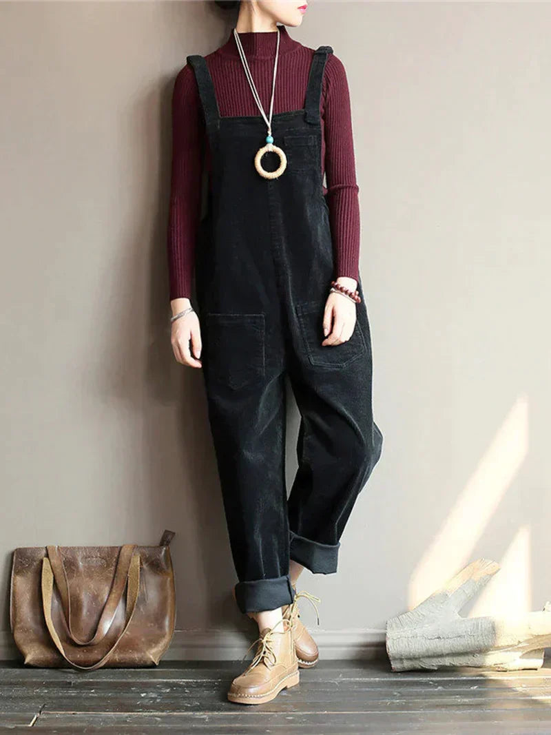 Stylish women's denim overall with a straight leg, crafted from breathable fabric for versatile fashion.