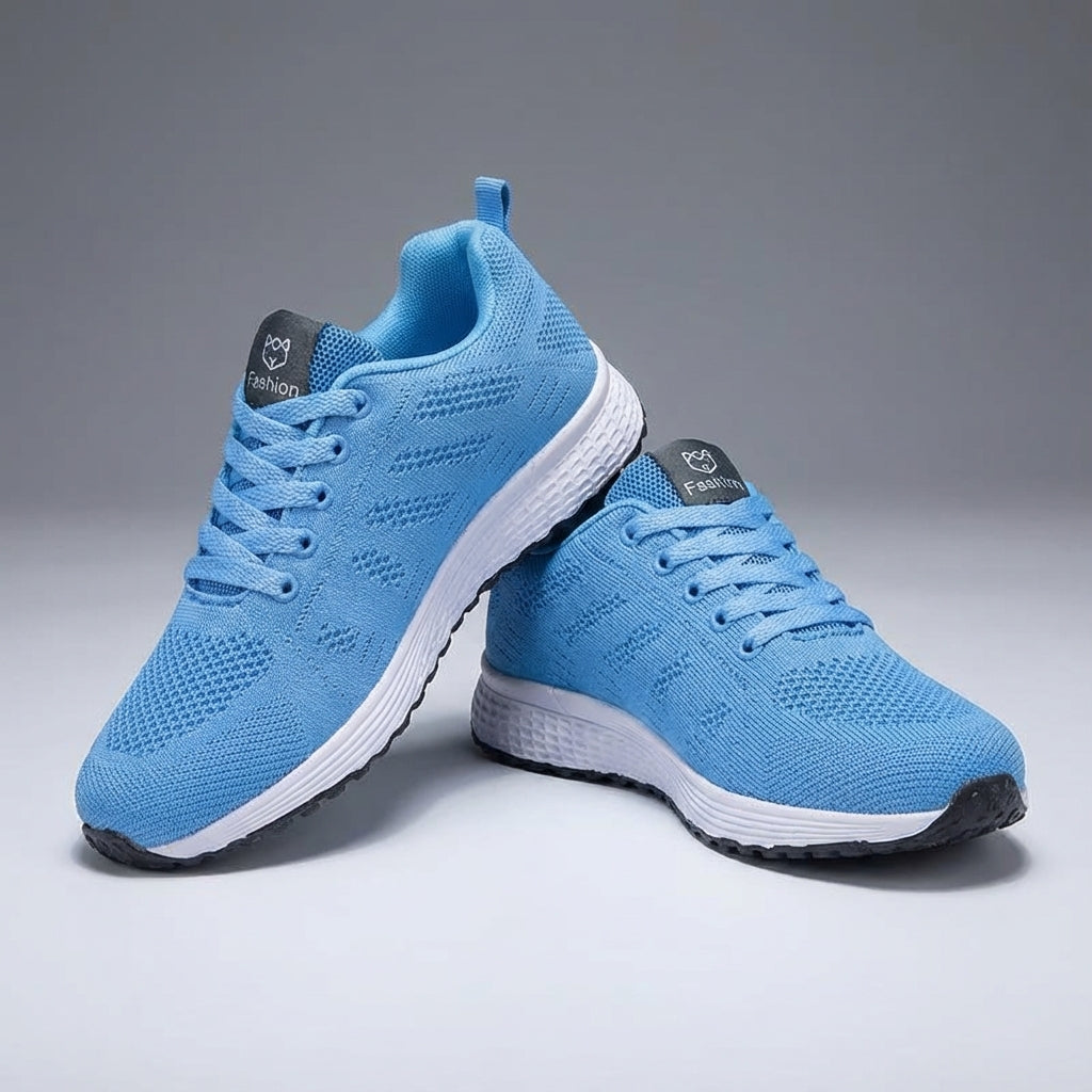 Lightweight women's knitted sports sneakers with flexible sole, perfect for training
