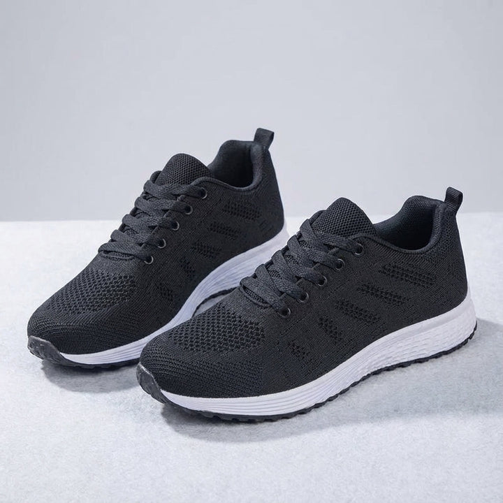 Comfortable women's sports shoes with a breathable knit upper, athleisure style