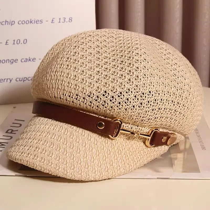 Chic buckle sun hat for women, knitted & breathable. A lightweight summer accessory for boho style.