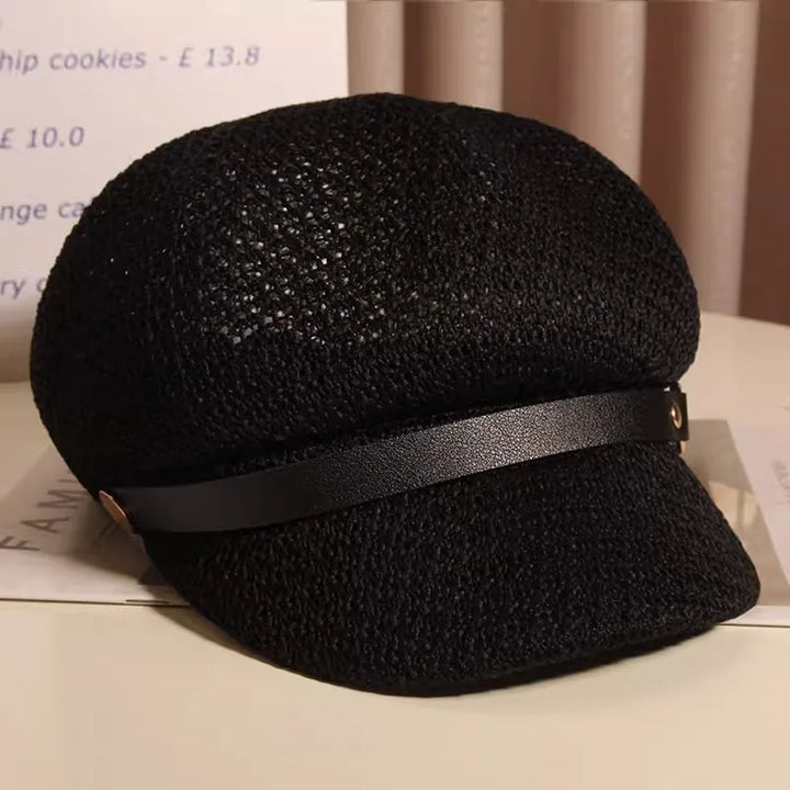 Breathable knitted sun hat for women, featuring a chic buckle. Essential lightweight summer beach accessory.