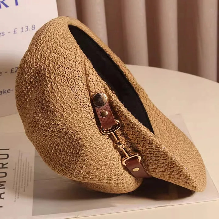 Lightweight women's knitted sun hat with breathable fabric and a chic buckle. Ideal for summer fashion.