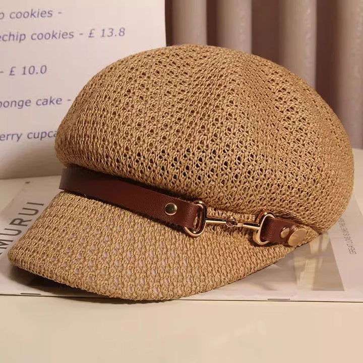Elegant women's sun hat, knitted & breathable, with a chic buckle. Perfect for summer and beach fashion.
