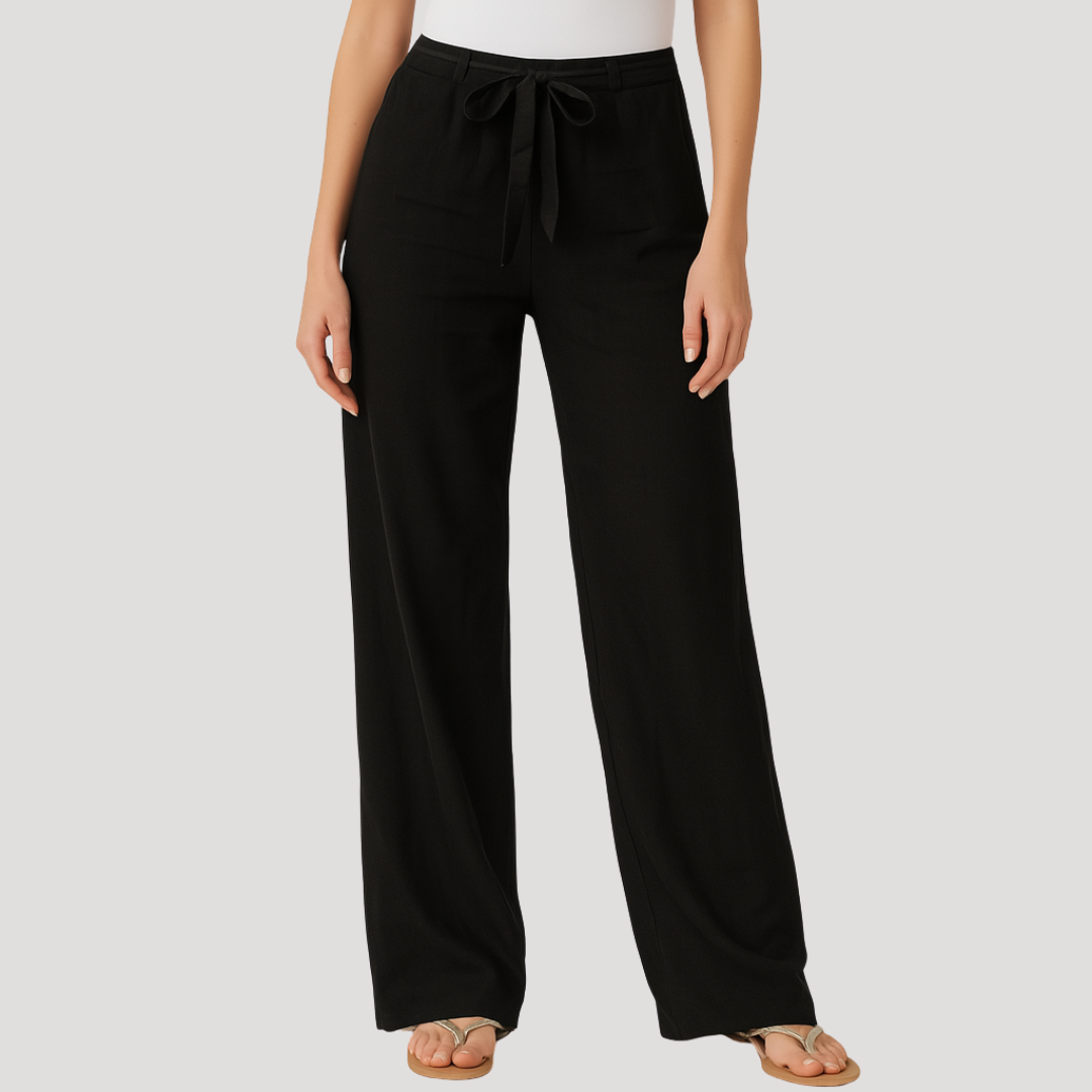 Relaxed fit women's linen pants with straight leg and drawstring, offering breathable comfort for warm weather fashion.