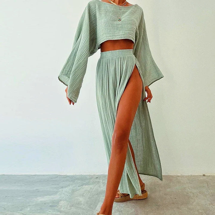 Relaxed fit women's linen skirt set: cropped top & slit skirt for comfortable, chic summer fashion.