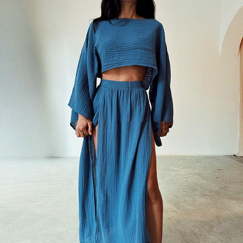 Casual women's linen two-piece skirt set with a comfortable cropped top & a chic slit skirt for summer.