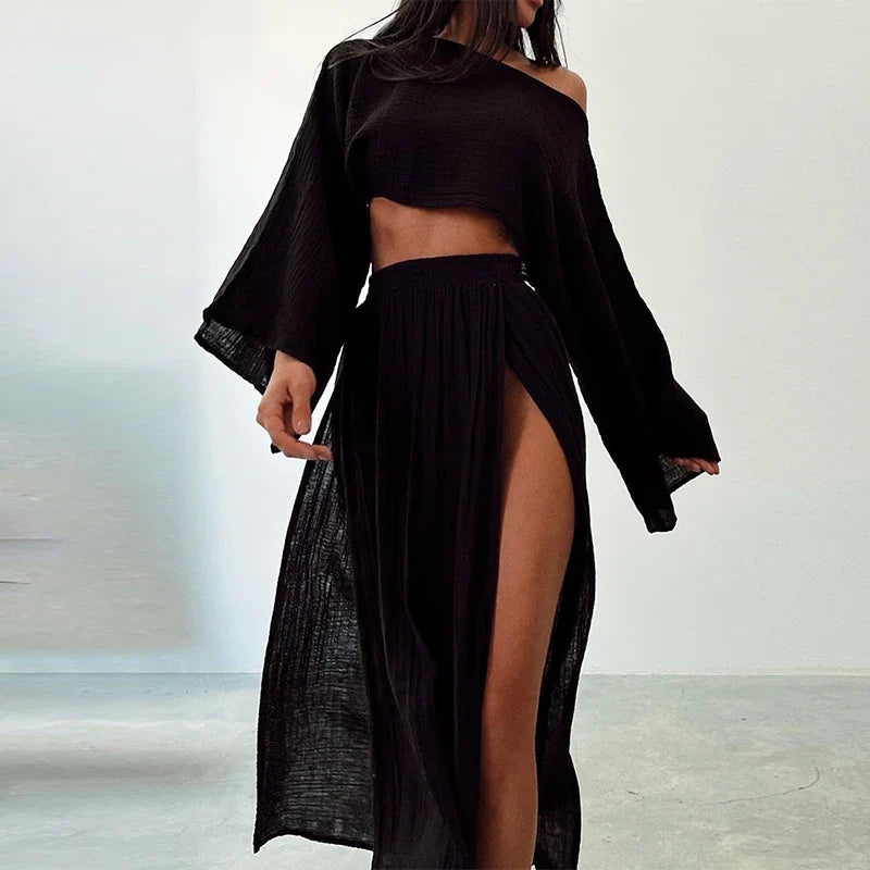 Chic women's linen two-piece skirt set: relaxed fit, cropped top, and elegant slit skirt for ultimate summer style.
