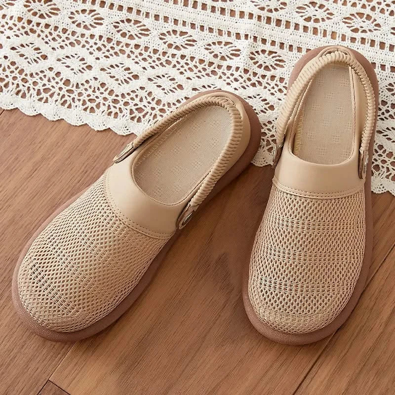 Comfortable women's mesh clogs, easy slip-on design for breathable summer wear and casual style.