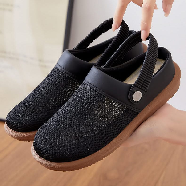 Lightweight mesh slip-on clogs for women, offering breathability & comfort, perfect for easy wear.