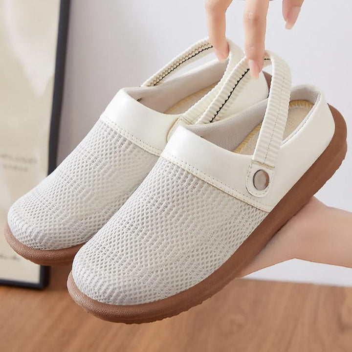 Soft, cushioned women's mesh clogs, featuring a breathable slip-on design for lasting comfort.