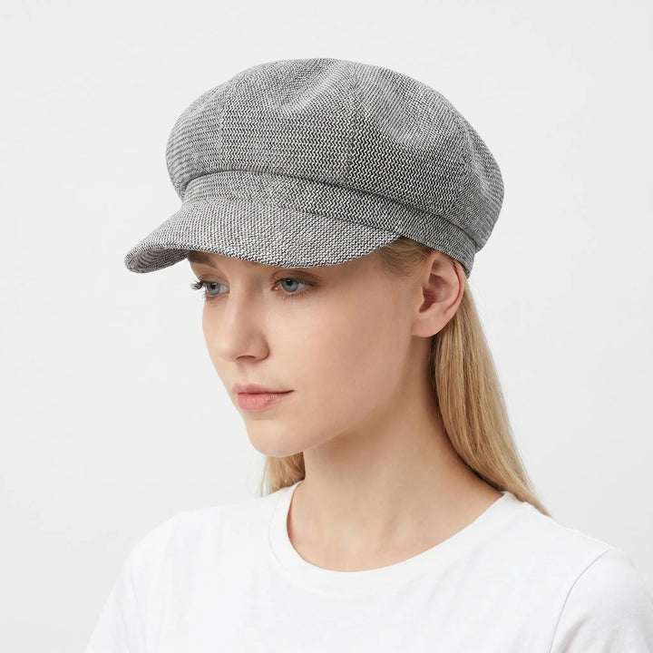 Lightweight women's travel sun hat with a breathable open-weave design, great for outdoor adventures.