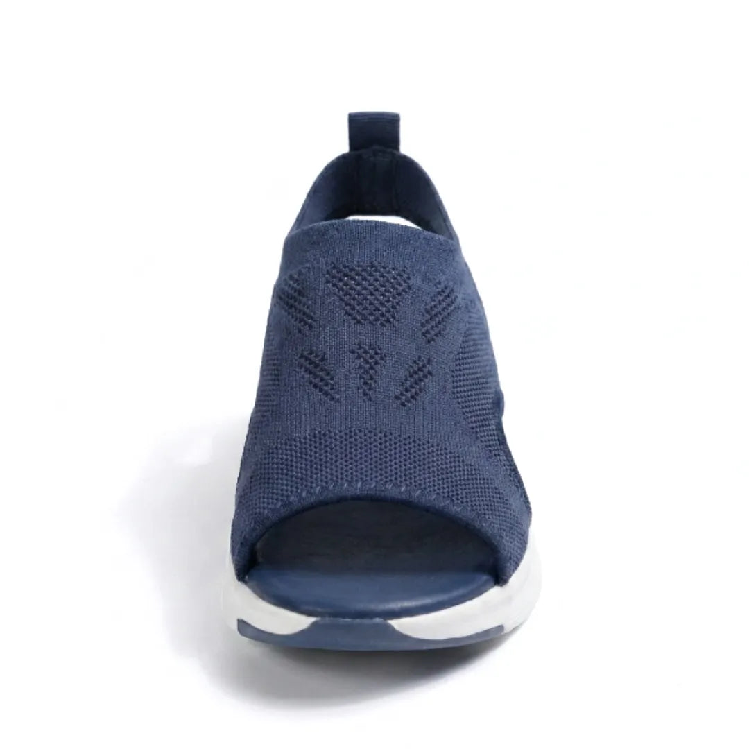 Orthopedic wedge heel sandals for women, breathable & comfortable for long walks. Provides excellent foot support.