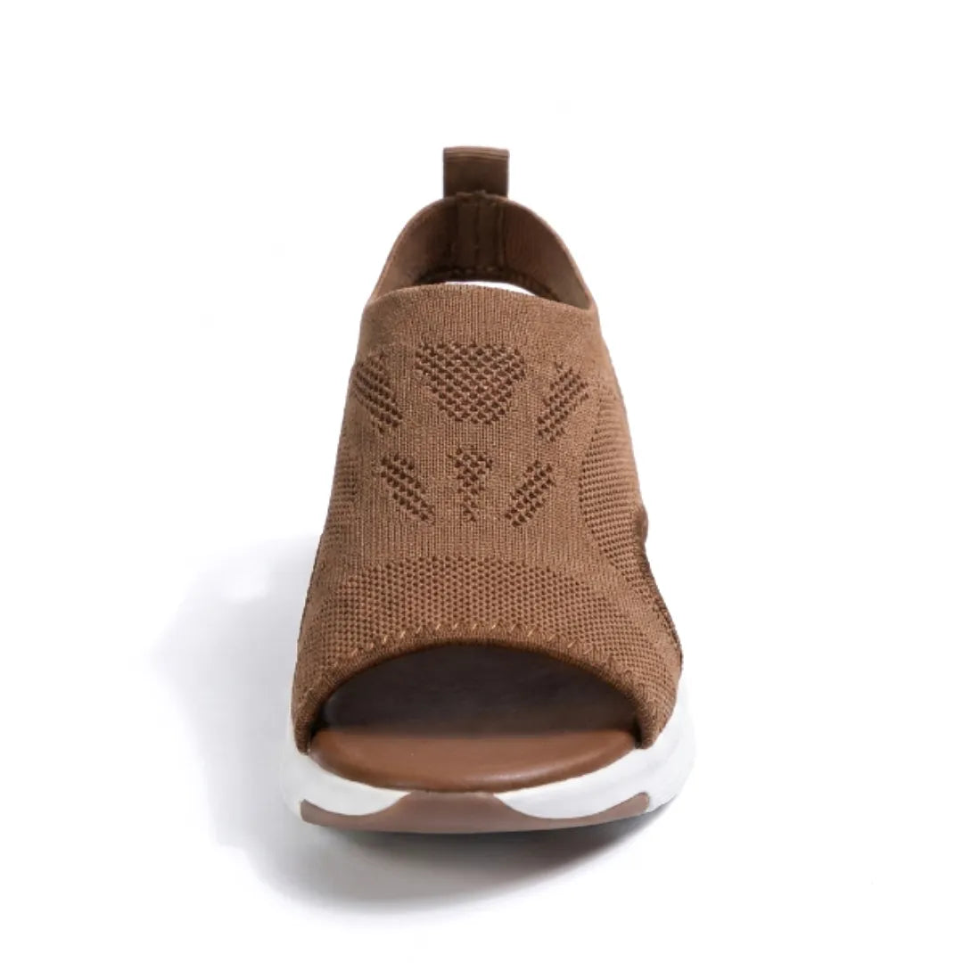 Stylish women's summer wedge sandals, breathable & orthopedic for casual walking. Comfortable footwear choice.