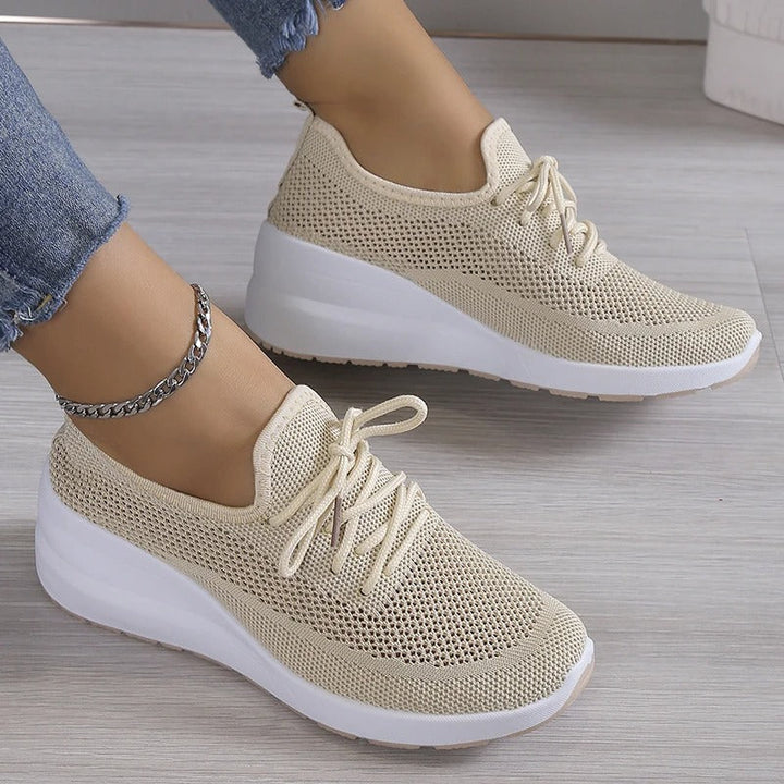 Women's breathable platform wedge sneakers, perfect for comfort & elevated style. Lightweight casual athletic footwear.