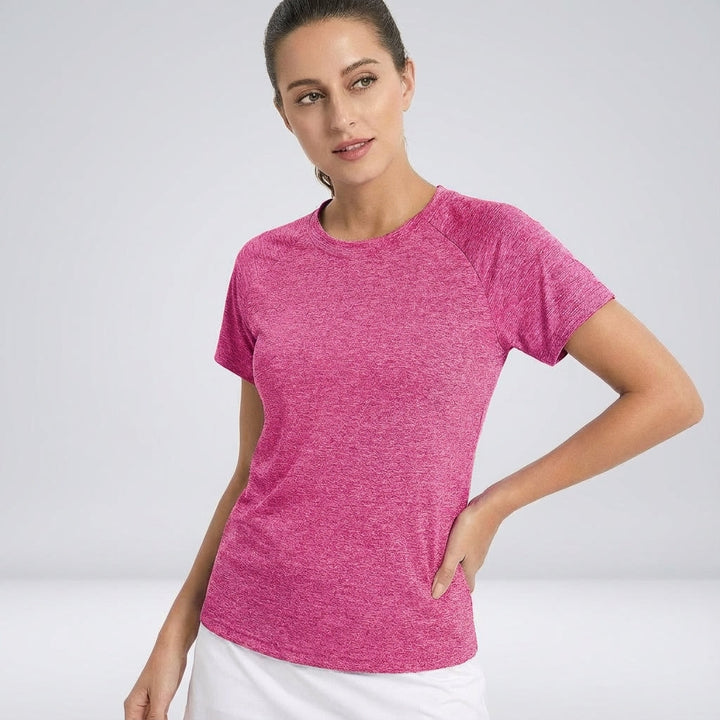 Woman wearing gray short sleeve breathable sport shirt, ideal for running and workouts