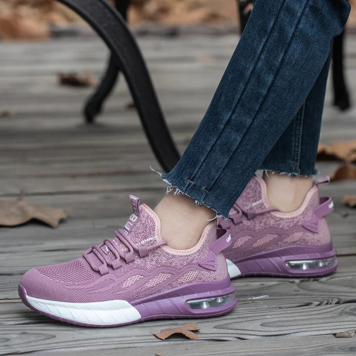Purple women's breathable safety shoes with steel toe, ideal for demanding work, non-slip & comfortable.