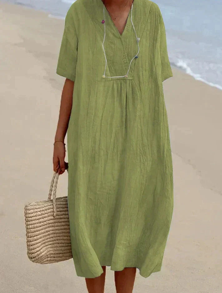 Comfortable women's A-line summer dress with pockets, ideal for beach days, picnics, or everyday wear.