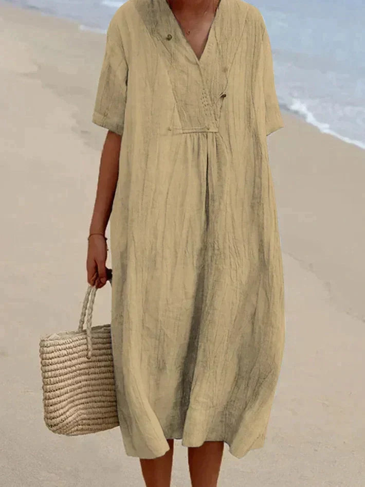 Stylish women's breezy A-line dress with a flowy silhouette, perfect for warm weather and comfortable styling.