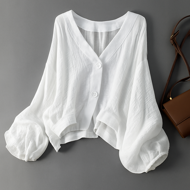 Women's breezy balloon sleeve blouse, perfect for a casual chic summer look. Breathable and comfortable.