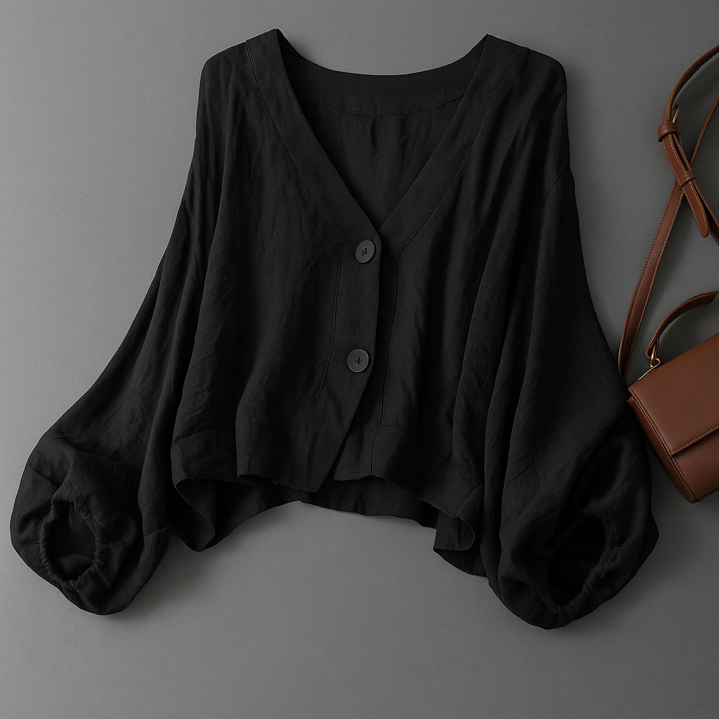 Comfortable women's button-down blouse with elegant balloon sleeves. Ideal for spring and summer fashion.