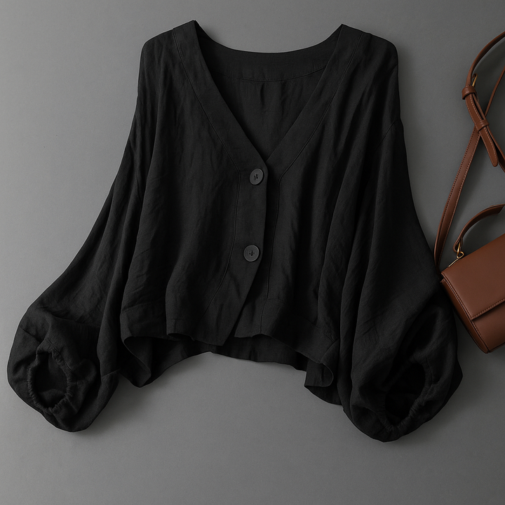 Comfortable women's button-down blouse with elegant balloon sleeves. Ideal for spring and summer fashion.