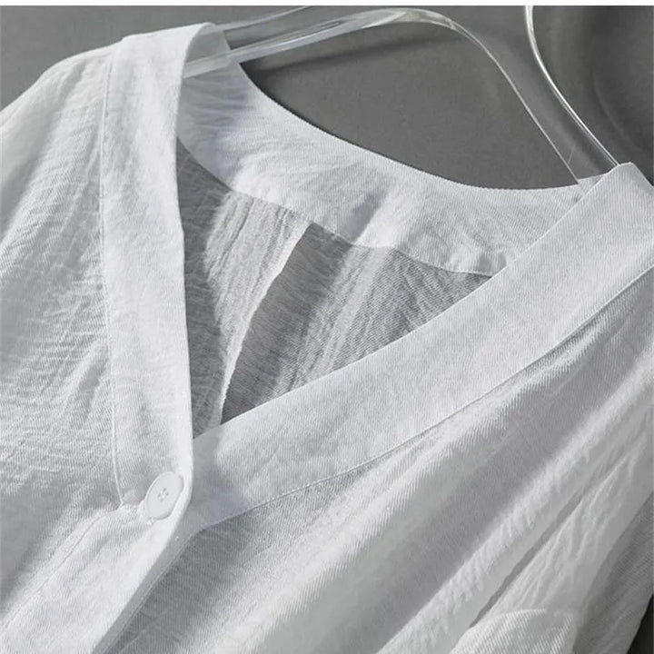 Relaxed fit women's balloon sleeve blouse. Versatile top for everyday style, casual yet chic for warm weather.