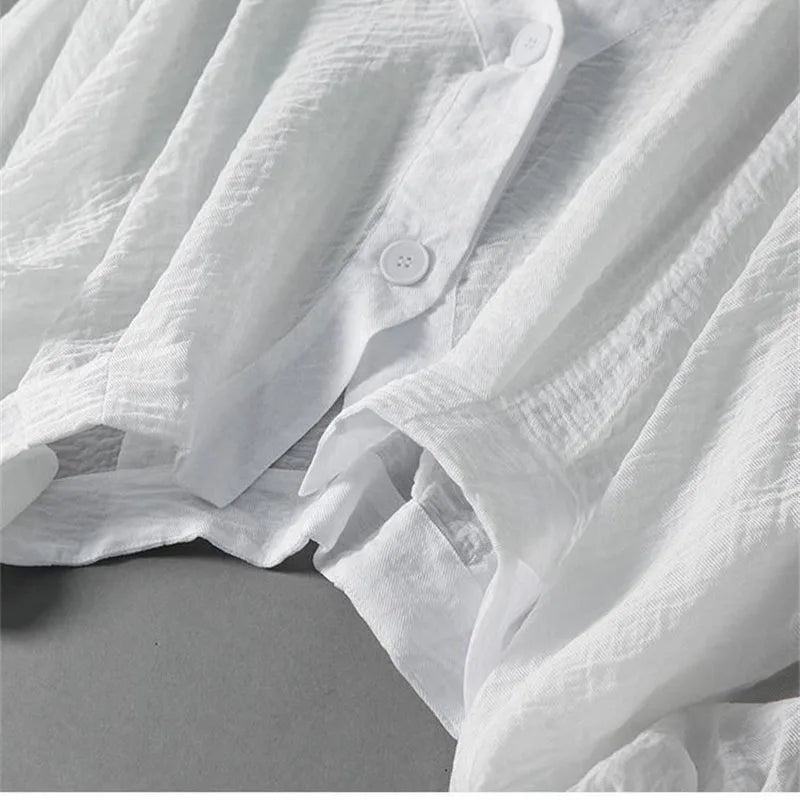 Stylish women's breezy blouse with voluminous balloon sleeves. Effortless and elegant for any warm weather occasion.