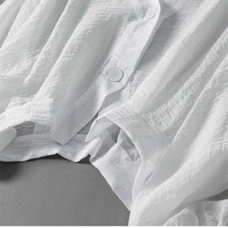 Women's loose batwing top, stylish and comfortable for summer; perfect as a breezy everyday blouse.