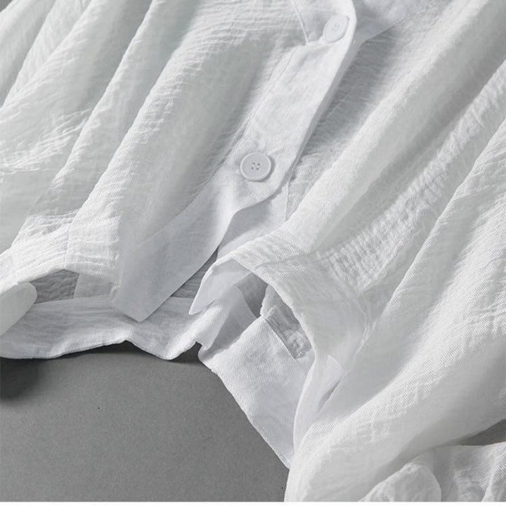 Women's loose batwing top, stylish and comfortable for summer; perfect as a breezy everyday blouse.