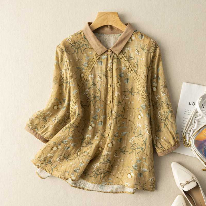 Elegant women's long sleeve floral print shirt featuring a scalloped hem. A versatile spring/summer blouse.