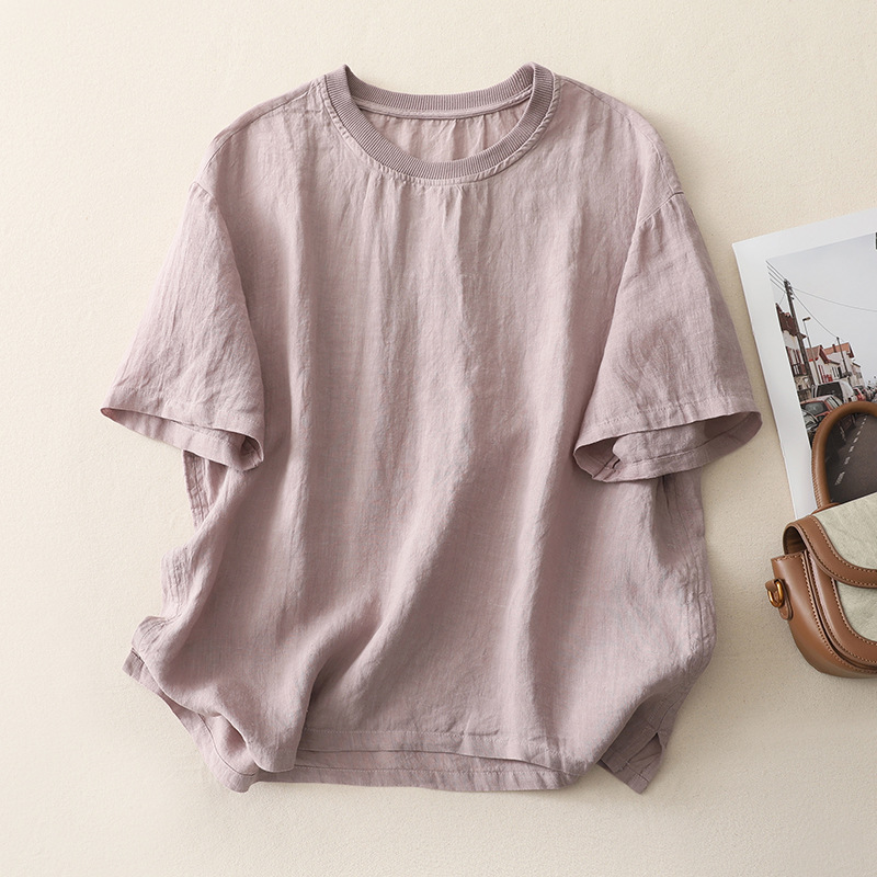 Relaxed fit women's linen blend tee, a versatile & breathable top for casual summer outfits.