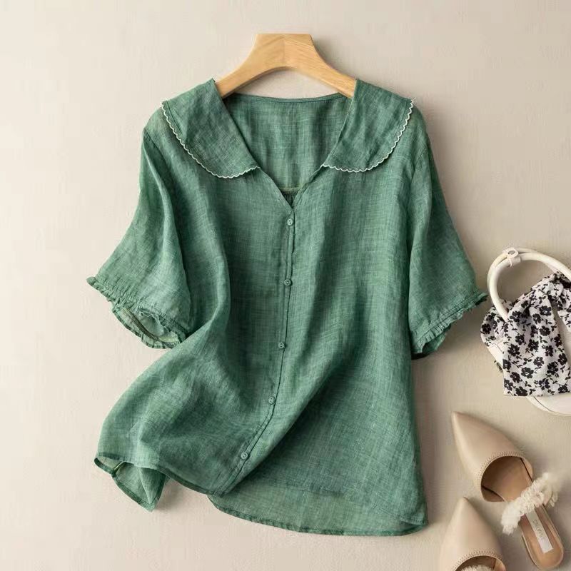 Women's breezy scallop collar blouse, perfect for summer fashion. Effortless, elegant, and comfortable casual top.