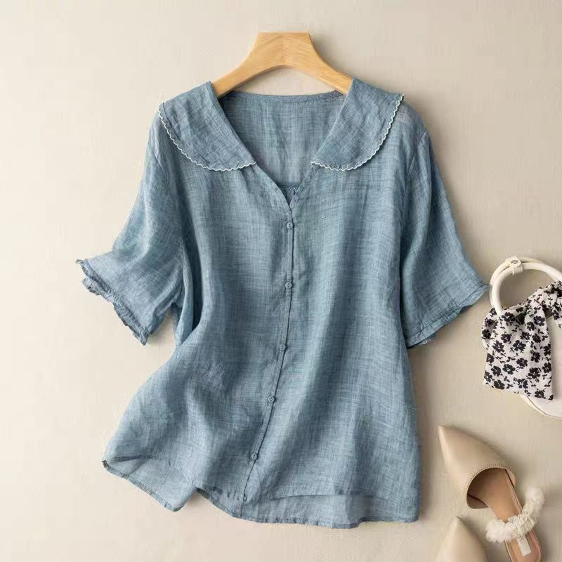 Comfortable women's breezy top with unique scallop collar. A versatile, relaxed fit blouse for casual summer fashion.