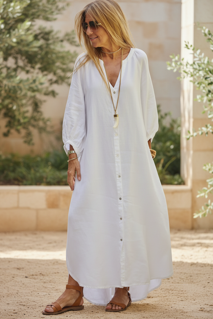 Lightweight women's button-up summer dress. Flowy, soft fabric offers ultimate comfort and versatile style.