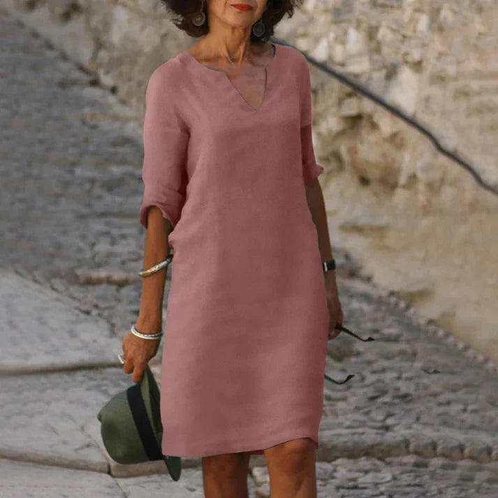 Women's breezy V-neck midi dress, perfect for effortless summer style and comfort.