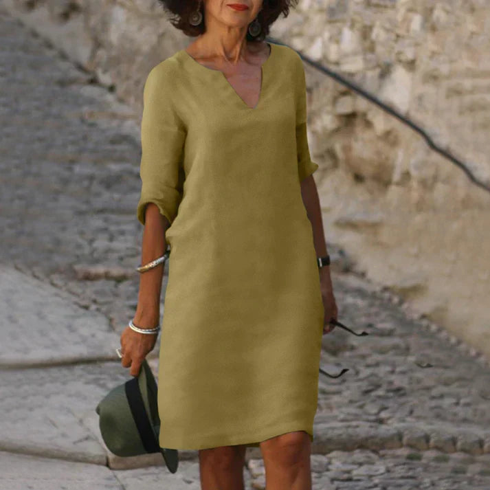 Effortless V-neck midi dress for women, embodying breezy comfort and elegant summer fashion.