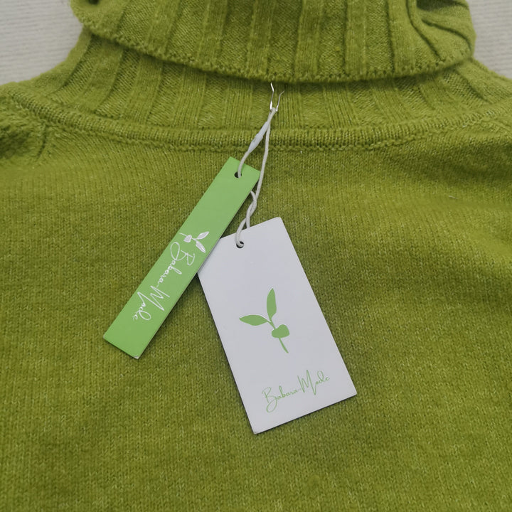 Cozy and chic bright green oversized turtleneck sweater, a must-have for women's winter wardrobe.