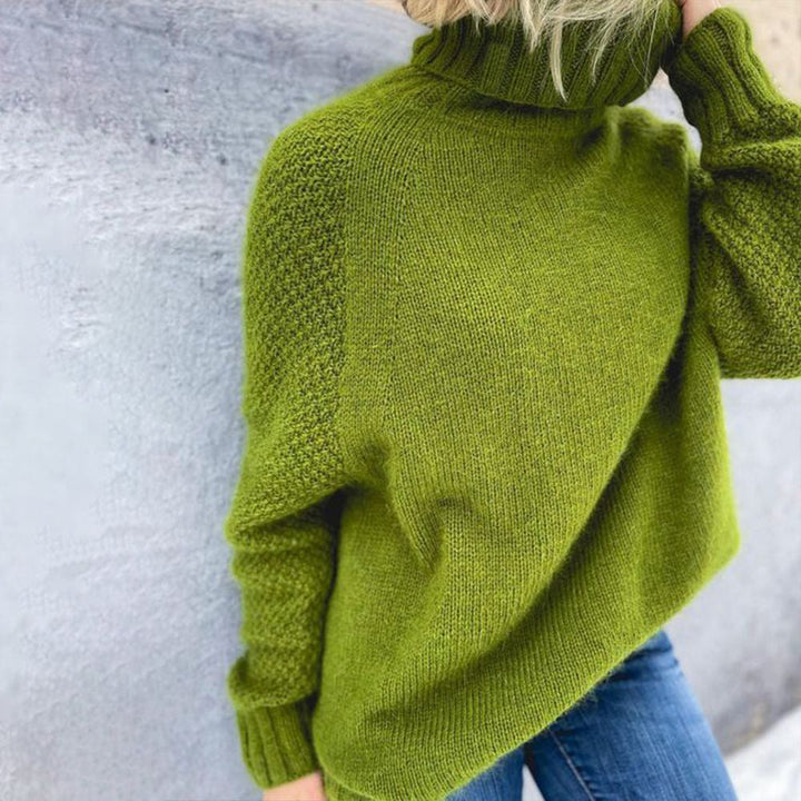 Women's bright green long sleeve knit sweater, oversized for a relaxed fit and modern style.